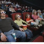 People in Theater Watching 3-D Movie